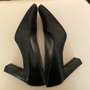 Pumps in excellent used condition. Size 12 M